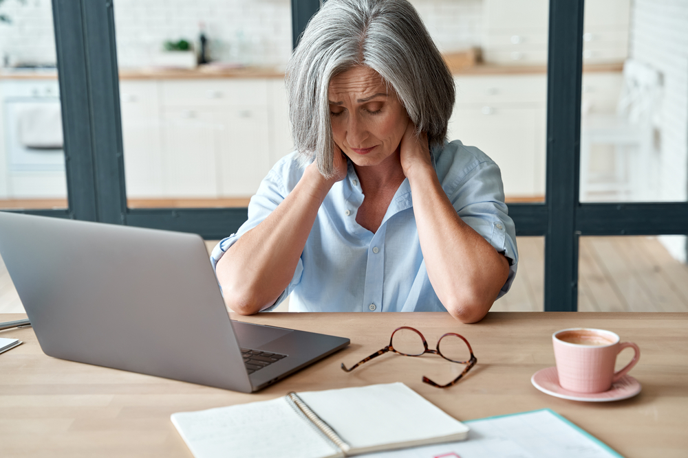 Woman suffering from fatigue from chronic pain.