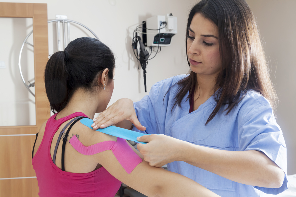 Woman at sport medicine doctor.