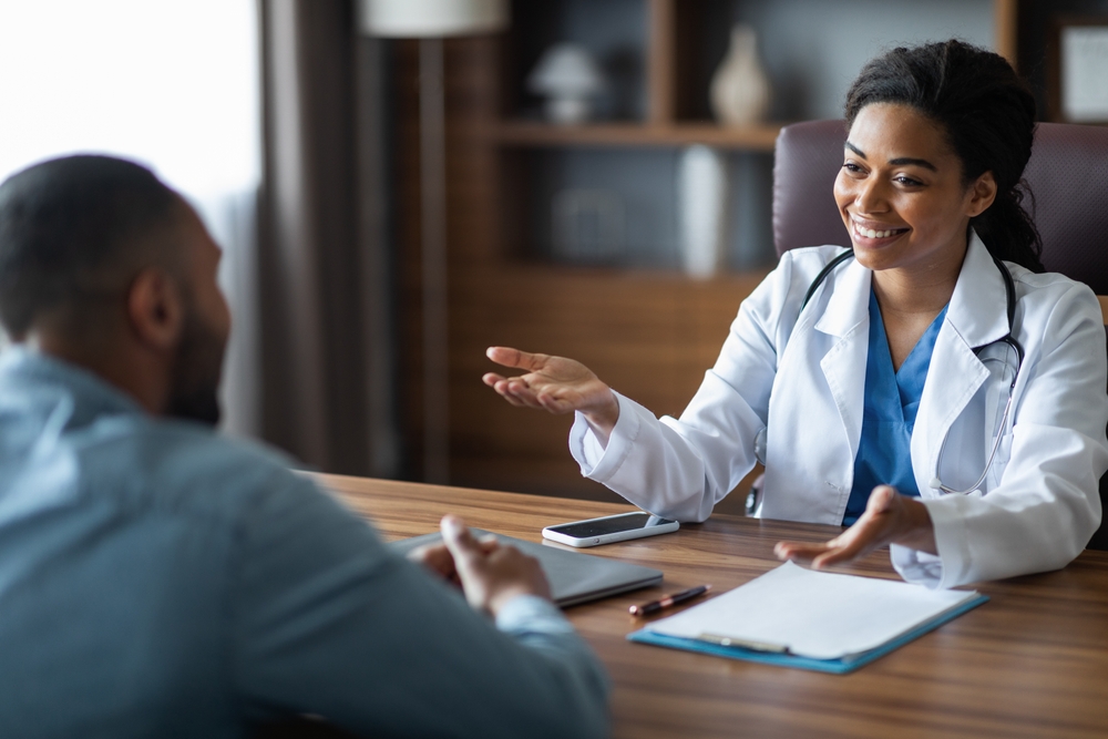 Man having a discussion with a doctor.